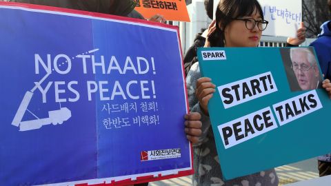 Anti-war activists protest Tillerson in Seoul.