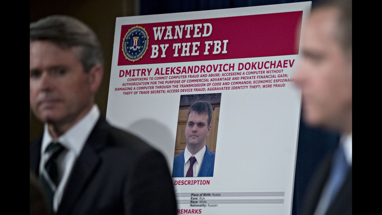A wanted poster for Dmitry Dokuchaev is displayed during a Justice Department news conference on Wednesday, March 15. Four people, including two officers of the Russian Federal Security Service (FSB), <a href="http://www.cnn.com/2017/03/14/politics/justice-yahoo-hack-russia/" target="_blank">have been indicted</a> in connection with a massive hack of the company Yahoo. Dokuchaev was identified as one of the officers of the FSB -- Russia's successor to the Soviet Union's KGB. The hack, which authorities said was initiated in January 2014, affected at least 500 million Yahoo accounts. 