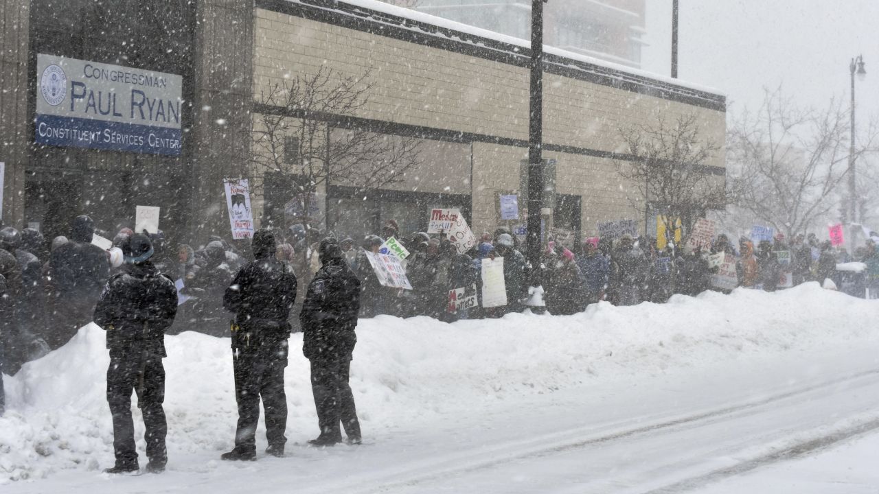 People in Racine, Wisconsin, protest the Republican health care bill in front of an office of House Speaker Paul Ryan on Tuesday, March 14. The GOP proposal to repeal and replace Obamacare <a href="http://www.cnn.com/2017/03/16/politics/budget-committee-passes-republican-health-care-plan/index.html" target="_blank">cleared a key procedural hurdle</a> when the House Budget Committee voted in favor of the measure on Thursday, March 16.