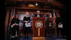 WASHINGTON, DC - MARCH 14:  (L-R) U.S. Sen. Tammy Duckworth (D-MN), Sen. Kirsten Gillibrand (D-NY), Sen. Bernie Sanders (I-VT), Sen. Amy Globuchar (D-MN) and Sen. Heidi Heitkamp (D-ND) attend a news conference at the U.S. Capitol on March 14, 2017 in Washington, DC. Senate Democrats annouced legislation to ensure American workers receive paid medical and family leave.  (Photo by Justin Sullivan/Getty Images)