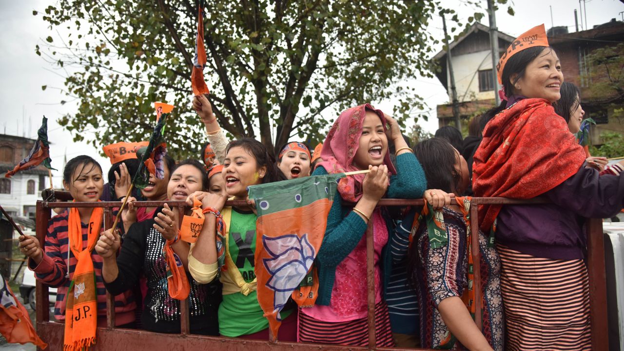 Supporters of Modi's BJP celebrate in Uttar Pradesh.