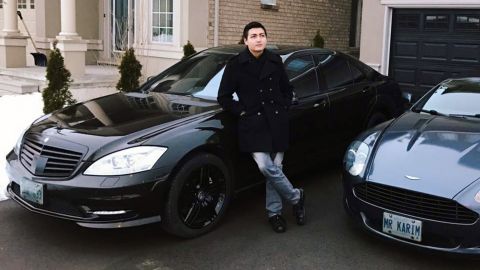 Karim Baratov with two of his cars at his home in Ancaster, Ontario.