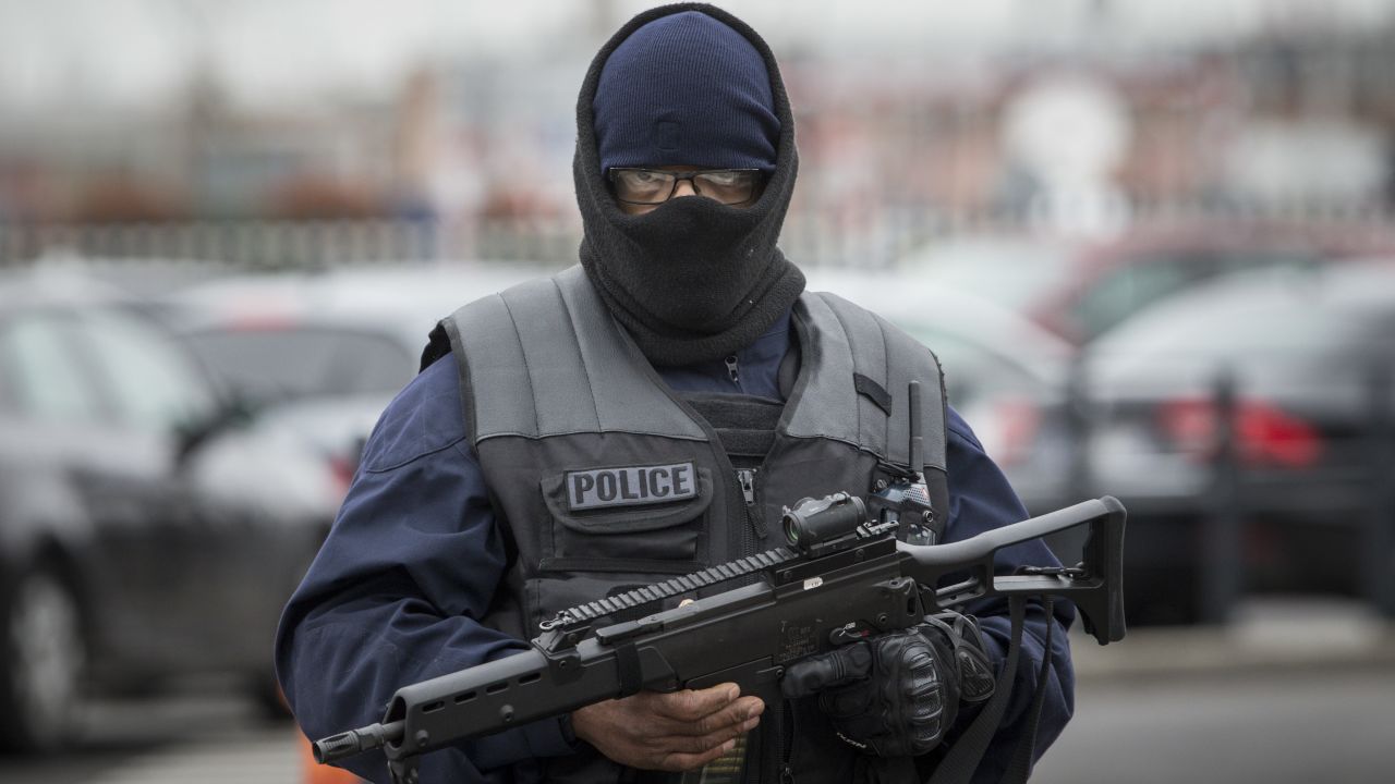 An elite police officer stands guard at Orly airport.