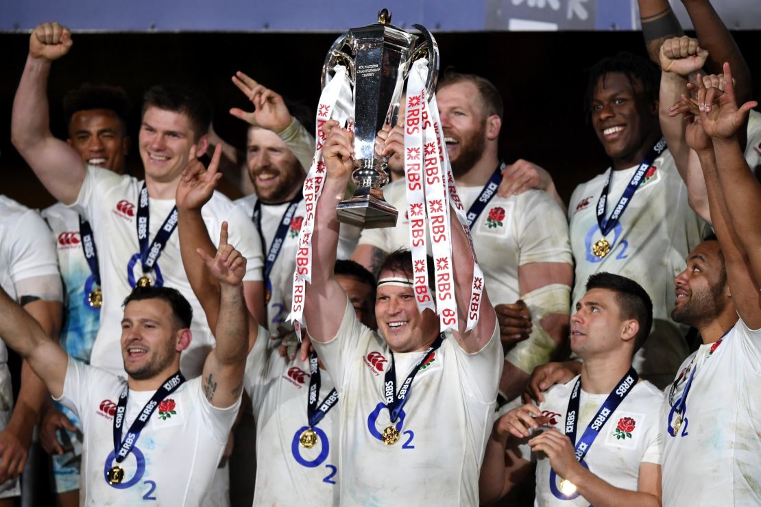 Captain Dylan Hartley lifts the Six Nations trophy for England after  Saturday's defeat.