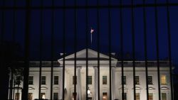 A tall security fence stands in front of the White House on this November 4, 2014 file photoin Washington, DC. Today 
