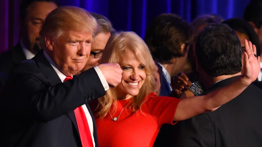 Republican presidential candidate Donald Trump falnked by campaign manager Kellyanne Conway waves to supporters following an address during election night at the New York Hilton Midtown in New York on November 9, 2016. 
Trump won the US presidency. / AFP / Timothy A. CLARY        (Photo credit should read TIMOTHY A. CLARY/AFP/Getty Images)