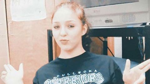 Elizabeth Thomas is 5 feet 5 inches tall and weighs about 120 pounds.