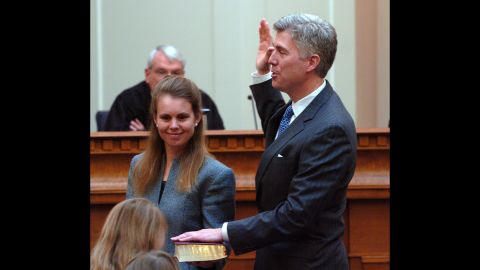 Gorsuch is sworn in as a member of the United States Court of Appeals for the 10th Circuit on November 20, 2006. His wife is holding the Bible.