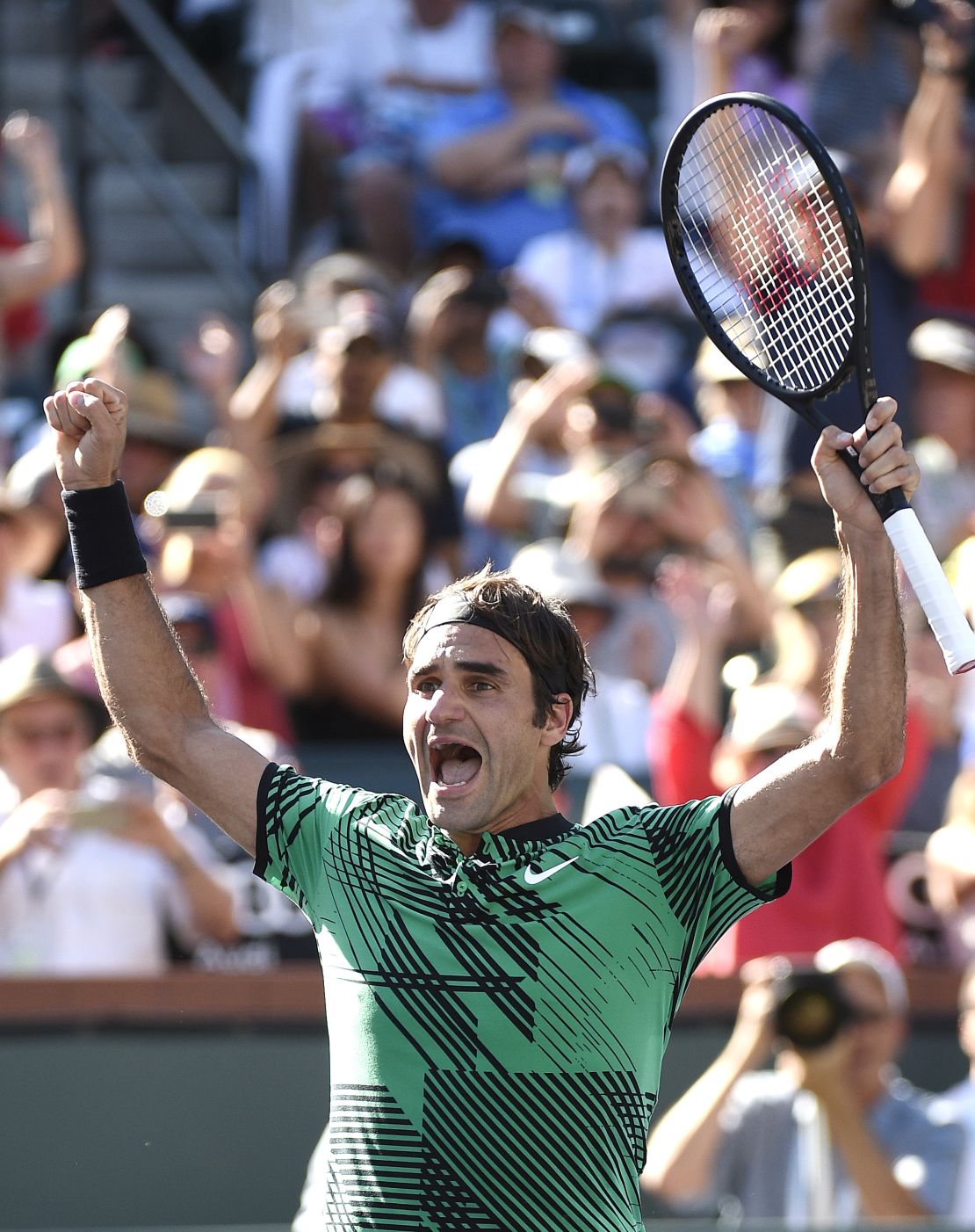 Roger Federer celebrates after defeating Stanislas Wawrinka in the men's final at Indian Wells.