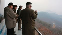 TOPSHOT - This undated picture released by North Korea's official Korean Central News Agency (KCNA) on March 19, 2017 shows North Korean leader Kim Jong-Un (R) inspecting the ground jet test of a newly developed high-thrust engine at the Sohae Satellite Launching Ground in North Korea.
North Korea has tested a powerful new rocket engine, state media said on March 19, with leader Kim Jong-Un hailing the successful test as a "new birth" for the nation's rocket industry. / AFP PHOTO / KCNA VIA KNS / STR / South Korea OUT / REPUBLIC OF KOREA OUT   ---EDITORS NOTE--- RESTRICTED TO EDITORIAL USE - MANDATORY CREDIT "AFP PHOTO/KCNA VIA KNS" - NO MARKETING NO ADVERTISING CAMPAIGNS - DISTRIBUTED AS A SERVICE TO CLIENTS
THIS PICTURE WAS MADE AVAILABLE BY A THIRD PARTY. AFP CAN NOT INDEPENDENTLY VERIFY THE AUTHENTICITY, LOCATION, DATE AND CONTENT OF THIS IMAGE. THIS PHOTO IS DISTRIBUTED EXACTLY AS RECEIVED BY AFP. 

 /         (Photo credit should read STR/AFP/Getty Images)