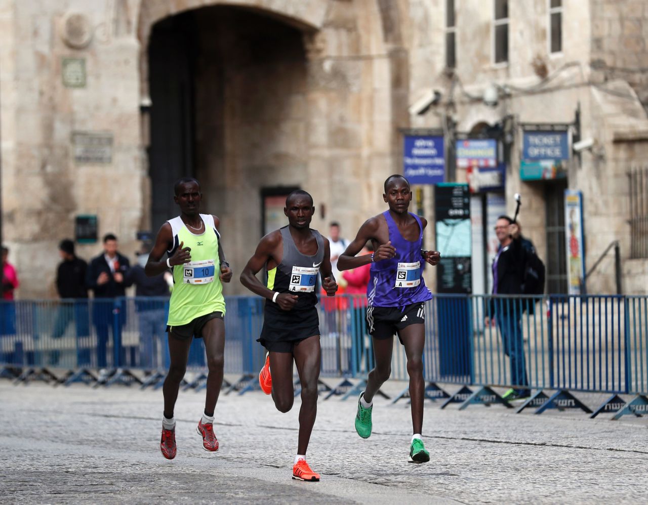 Kenya's Shadrack Kipkosgei (right) won the marathon for the second year in a row, in a time of 2:17:36, picking up the $3,750 prize. Ethiopia's Wendwesen Tilahun Damte (left) was second and Kenya's Matthew Kibiwott Sang (center) was third.
