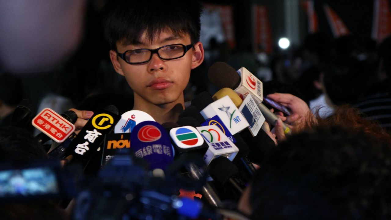 A 15-year-old Joshua Wong talks to the press at a Scholarism rally in July 2012.