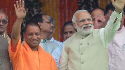 Chief Minister of Uttar Pradesh state Yogi Adityanath (C), Indian Prime Minister Narendra Modi (R) and Bharatiya Janata Party (BJP) president Amit Shah attend Adityanath's swearing-in ceremony as the Uttar Pradesh chief minister in Lucknow on March 19, 2017.
Prime Minister Narendra Modi's right-wing party on March 18 picked a controversial firebrand leader to head India's most populous state, where it won a landslide victory last week. After an hours-long meeting with local BJP legislators, senior party leader M. Venkaiah Naidu announced 44-year-old Yogi Adityanath as Uttar Pradesh's next chief minister.
 / AFP PHOTO / SANJAY KANOJIA        (Photo credit should read SANJAY KANOJIA/AFP/Getty Images)