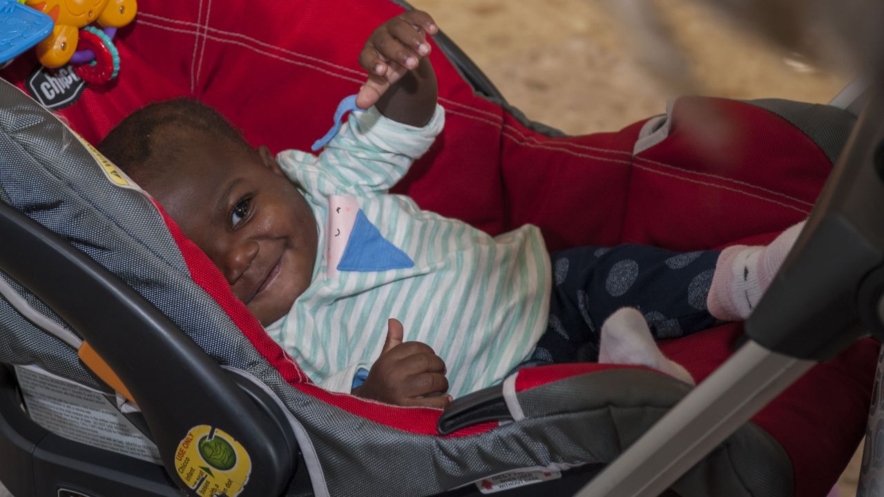 Five days after surgery, Dominique smiles as she prepares to leave the hospital.
