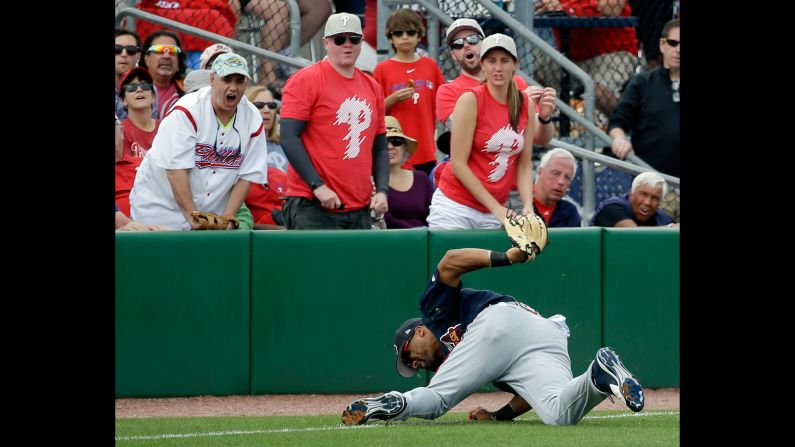Atlanta outfielder Micah Johnson makes a diving catch -- much to the dismay of Philadelphia fans -- during a spring-training game in Clearwater, Florida, on Tuesday, March 14.