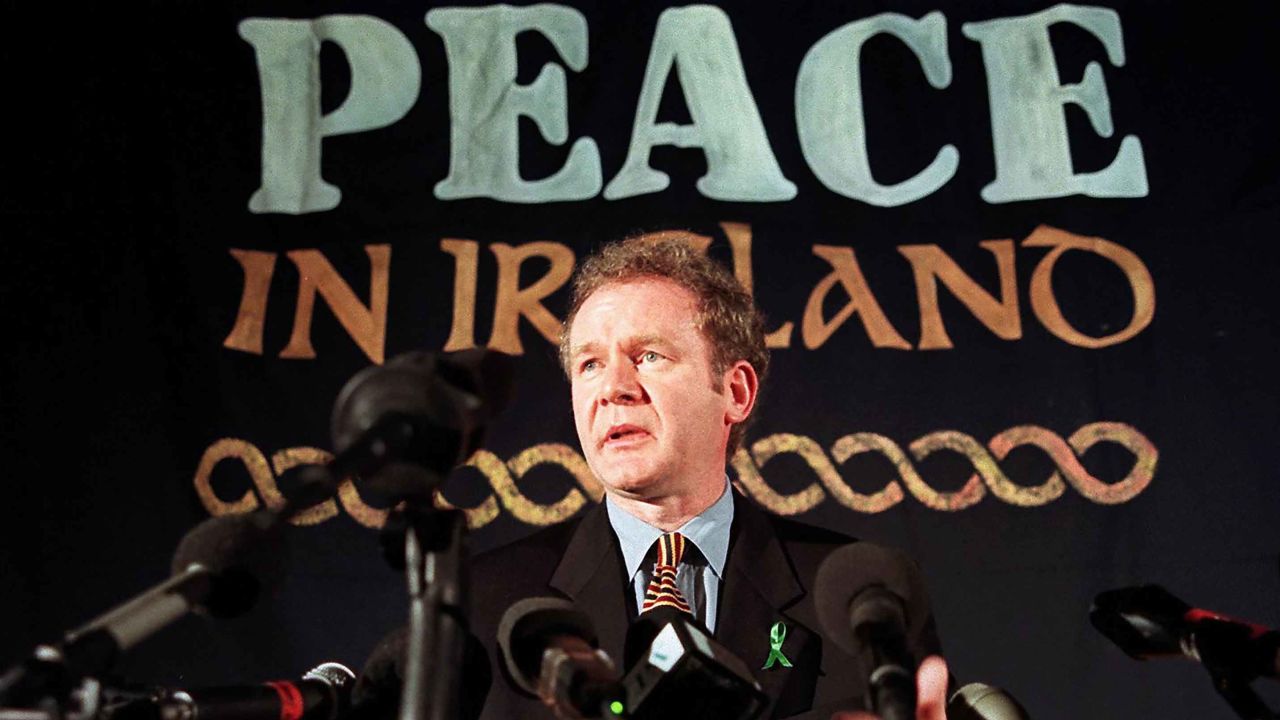 London, UNITED KINGDOM:  (FILES) Sinn Fein chief negotiator Martin McGuinness answering journalists' question during a press conference in London, 26 February 1998. Sinn Fein, the political wing of the Irish Republican Army (IRA), had asked for a meeting with British Prime Minister Tony Blair after being excluded from the all party peace process talks.The British and Irish governments welcomed 04 October 2006 a report that the Irish Republican Army (IRA) has eschewed terrorism, saying it paves the way for a final political settlement in Northern Ireland. Under the 1998 Good Friday Agreement aimed at ending decades of troubles in the British-ruled province on the island of Ireland, a power-sharing self-rule assembly was set up in Stormont castle in Belfast. But the assembly was suspended in 2002 following allegations of an IRA spy ring operating at the Stormont parliamentary buildings, and the province has been under direct rule from London ever since.                          AFP     PHOTO     GERRY PENNY/FILES   (Photo credit should read GERRY PENNY/AFP/Getty Images)