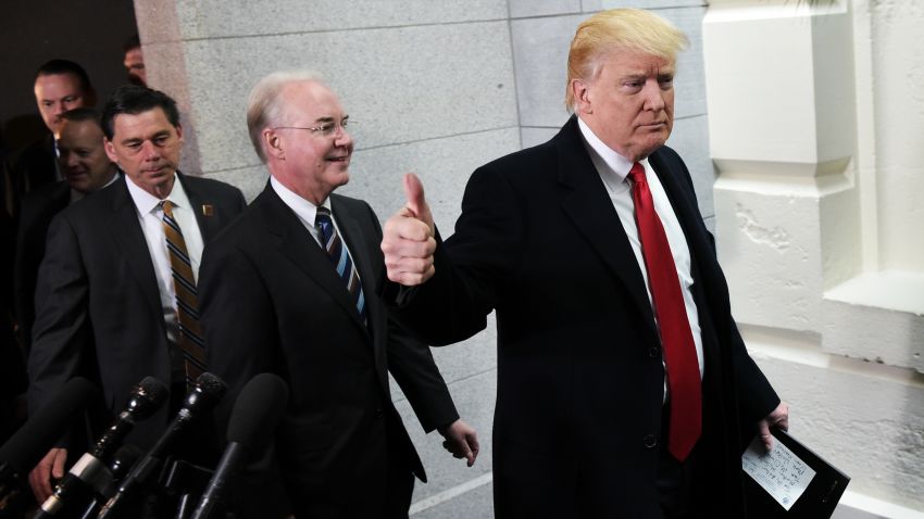 US President Donald Trump and Health and Human Services Secretary Tom Price (L) arrives at the US Capitol to meet with the Republican House Conference on March 12, 2017. / AFP PHOTO / Mandel Ngan        (Photo credit should read MANDEL NGAN/AFP/Getty Images)