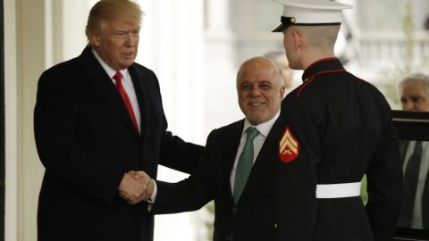 US President Donald Trump greets Iraqi Prime Minister Haider al-Abadi upon his arrival to the White House in Washington, DC on Monday.