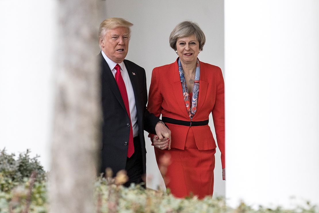 British Prime Minister Theresa May and U.S. President Donald Trump walk along The Colonnade of the West Wing at The White House on January 27, 2017 in Washington, DC.