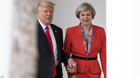 British Prime Minister Theresa May and U.S. President Donald Trump walk along The Colonnade of the West Wing at The White House on January 27, 2017 in Washington, DC.