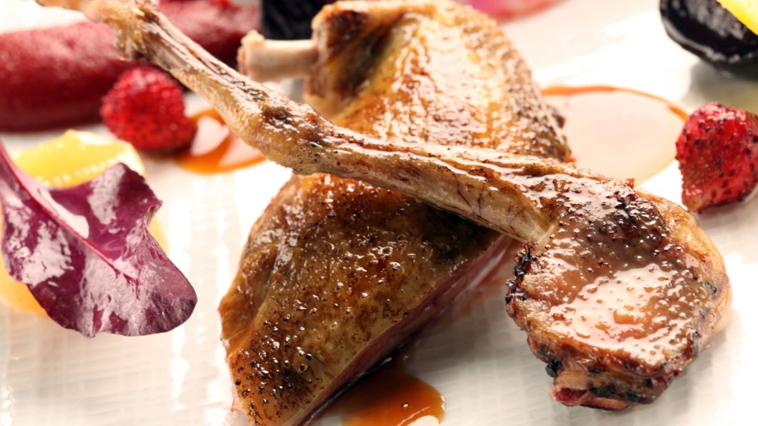 <strong>Pigeon with wild strawberries, Hélène Darroze La Salle à Manger:</strong> Hélène Darroze's pigeon dish features an innovative and refreshing combination of foie gras, beetroot, wild strawberries and Mexican mole sauce. <br />