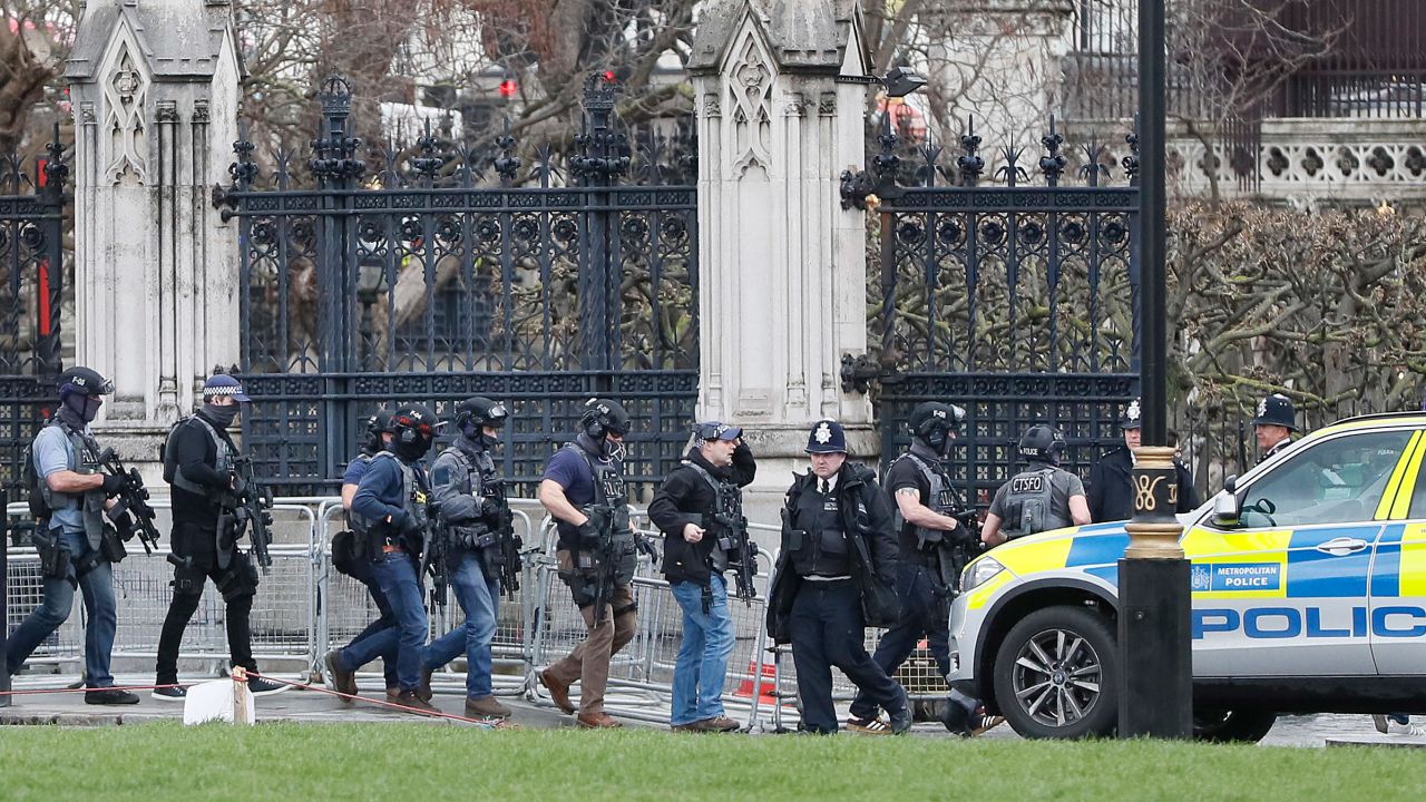 Armed police officers enter the Houses of Parliament in London, Wednesday, March 23, 2017 after the House of Commons sitting was suspended as witnesses reported sounds like gunfire outside.(AP Photo/Kirsty Wigglesworth)