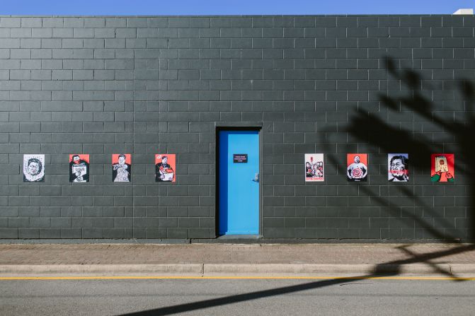 Badiucao's political cartoons seen outside the Praxis Artspace gallery in Adelaide, Australia in March 2017.