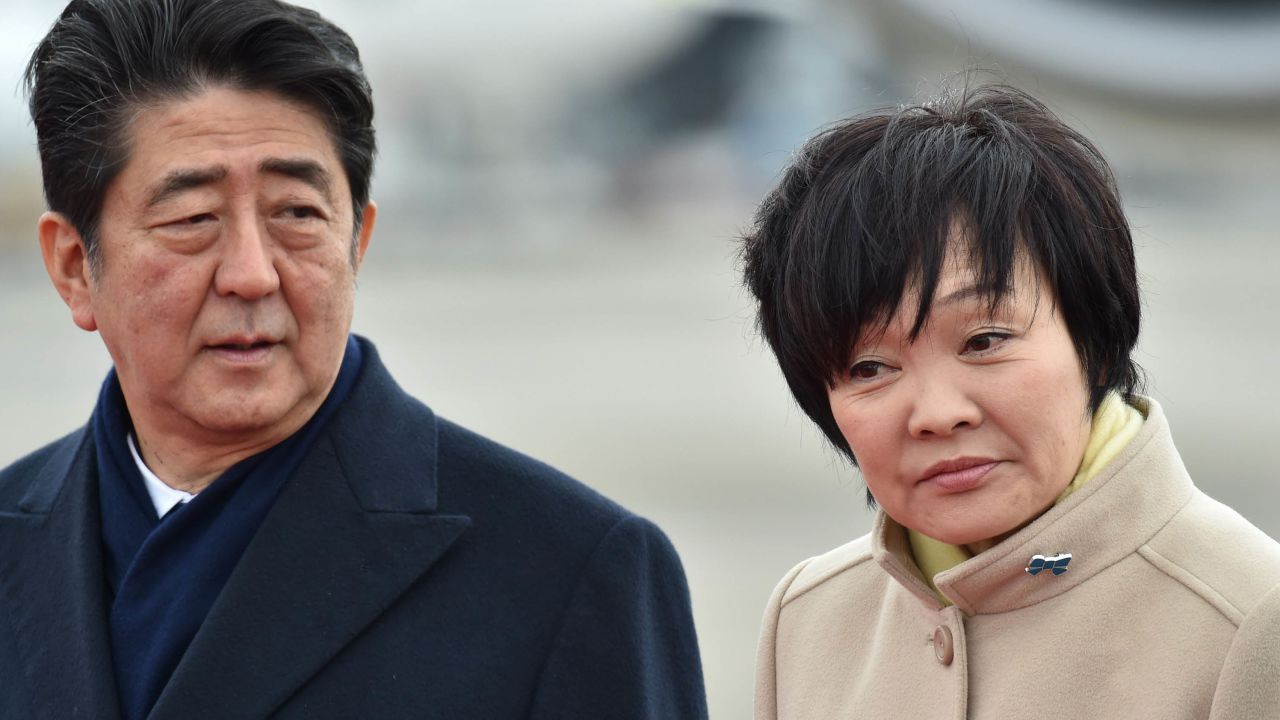 Japan's Prime Minister Shinzo Abe and his wife Akie see off Emperor Akihito and Empress Michiko as they leave for Vietnam from Tokyo's Haneda Airport on February 28.