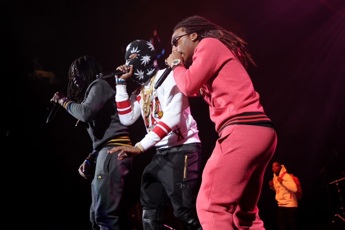 (From left) Quavo, Takeoff and Offset of Migos perform onstage.