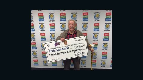 Ervin Smolinski with his Michigan lottery winnings. 