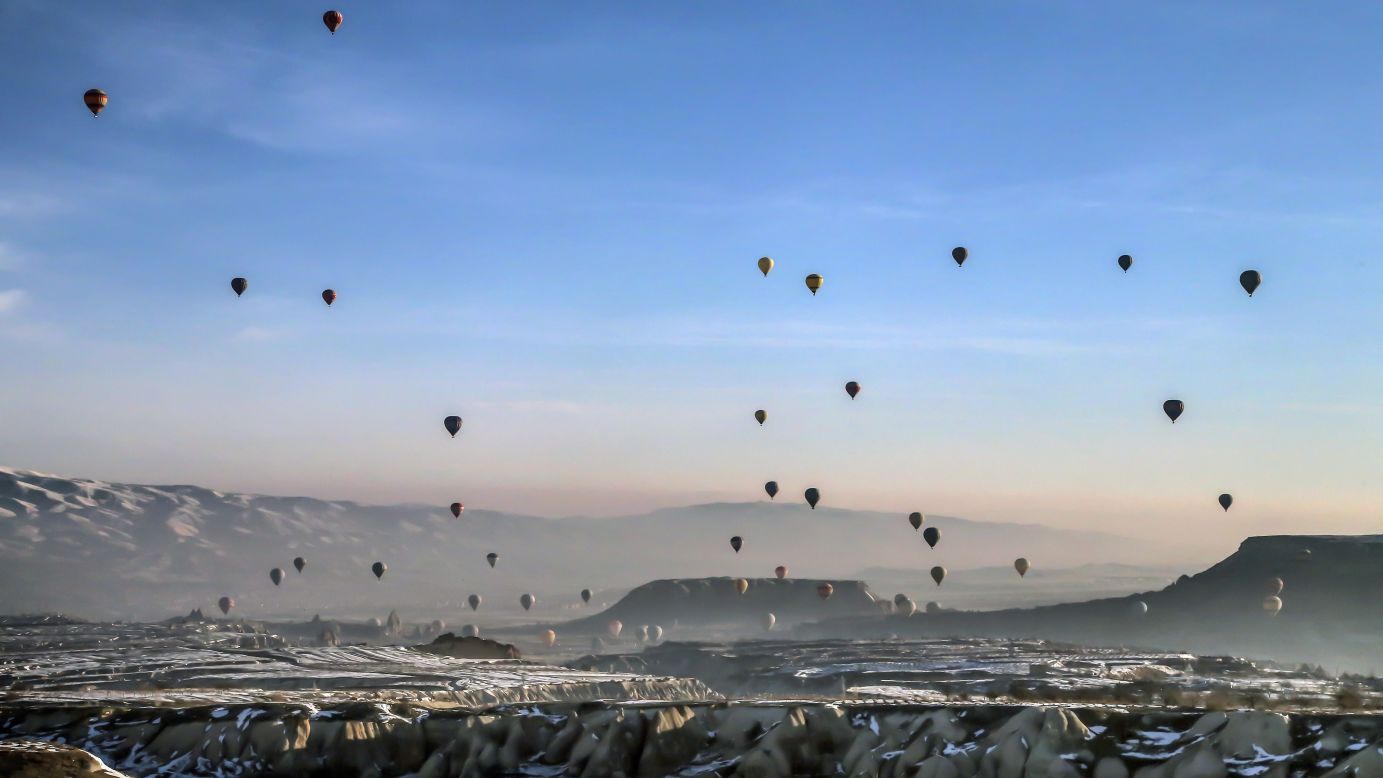 <strong>Cappadocia, Turkey:</strong> Hot-air ballooning is a popular tourist activity in Cappadocia, a UNESCO World Heritage Site in Central Anatolia. The area is characterized by a distinctive volcanic landscape and large network of ancient underground dwellings. 