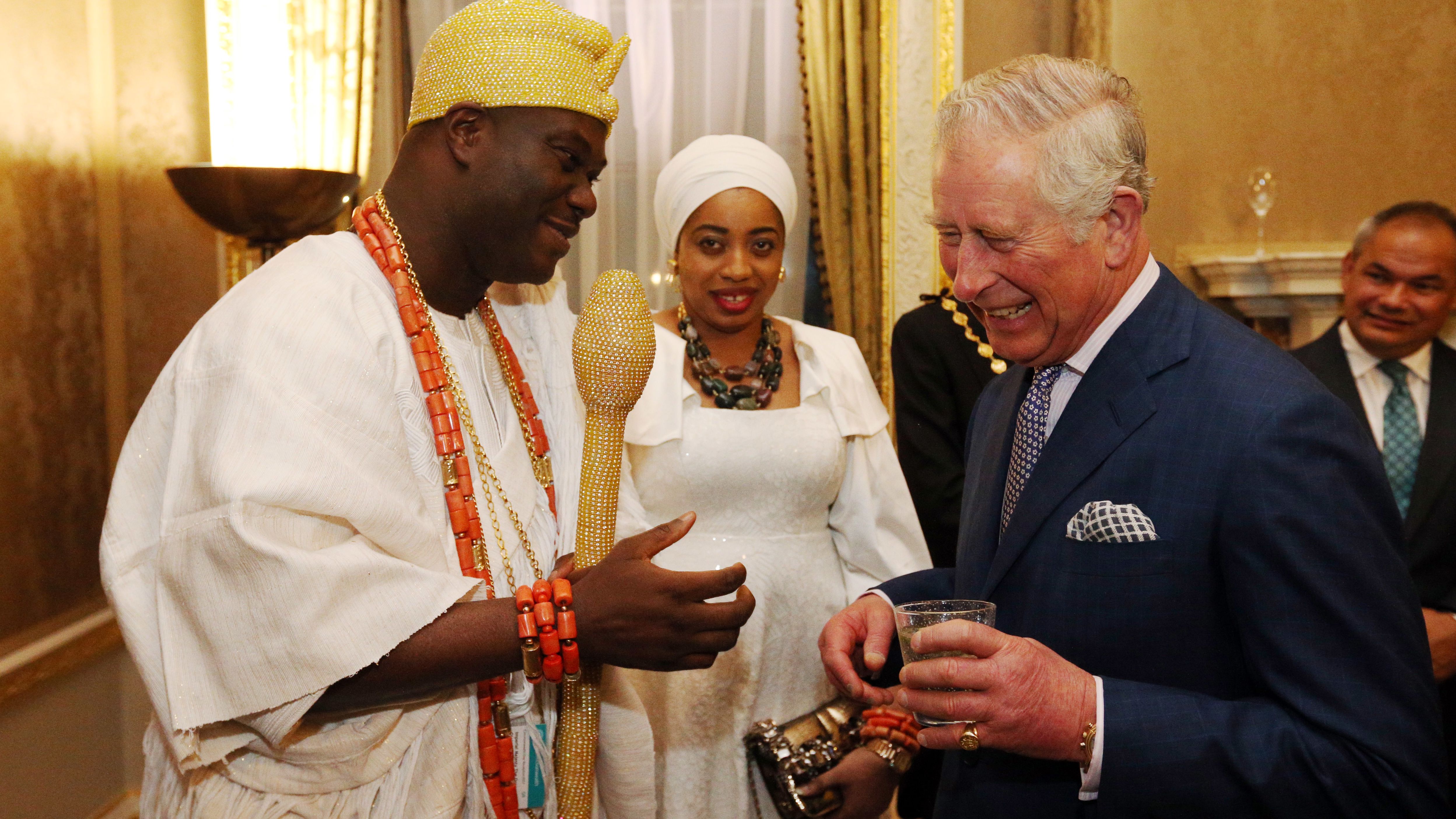 The Ooni of Ife and his wife meet with Prince Charles in London as he attends the annual Commonwealth Day Reception on March 13 2017. 