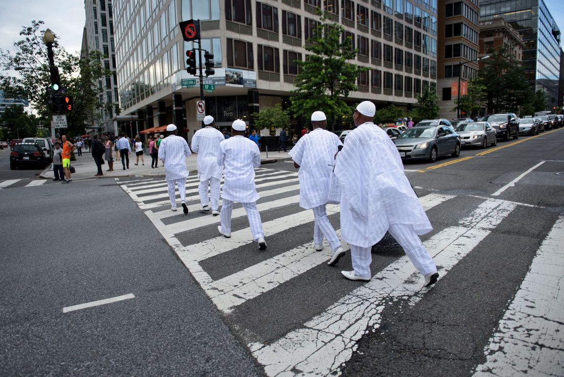 The Ooni of Ife is escorted across 17th Street near the White House June 22, 2016 in Washington, DC. His Majesty is keen to visit as many places as possible to "connect the dots" between Nigerian cultural heritage and the rest of the world. 