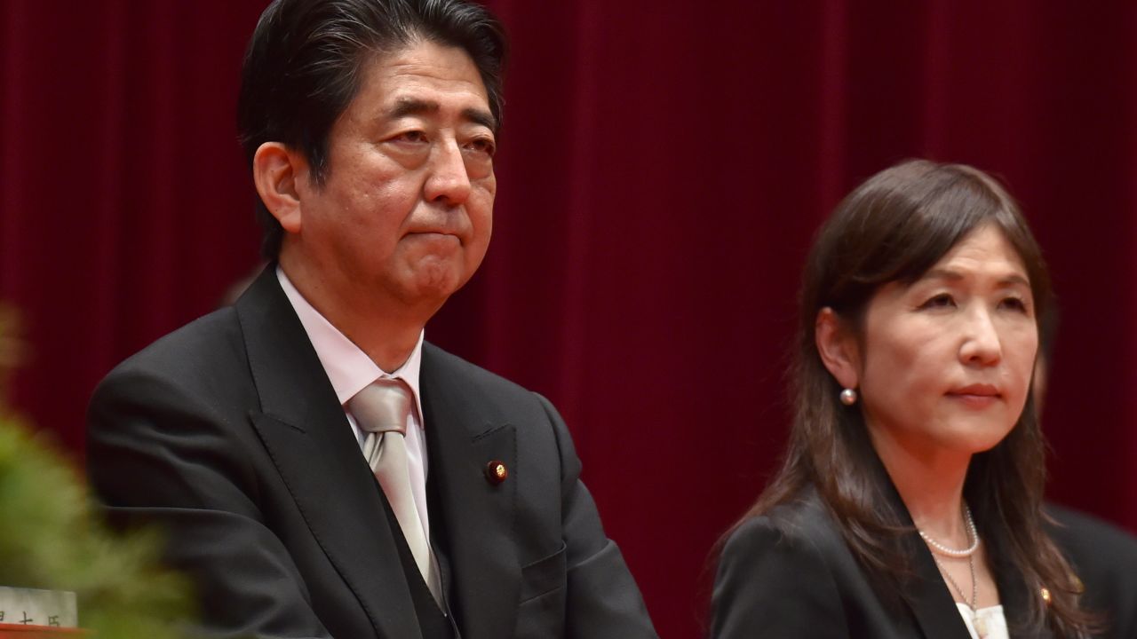 Japanese Prime Minister Shinzo Abe (left) and Defense Minister Tomomi Inada (right) attend the graduation ceremony of the National Defense Academy on March 19.
