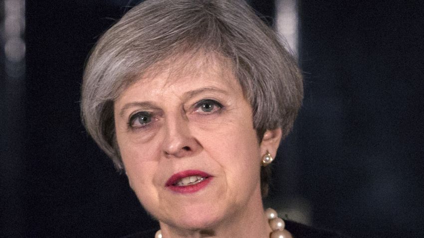 British Prime Minister Theresa May speaks outside 10 Downing Street in central London on March 22, 2017, following the terror incident in Parliament earlier today.
Britain will not change its terrorism threat level despite an attack in London on Wednesday which left three people and the assailant dead, Prime Minister Theresa May said. Three people were killed in a "terrorist" attack in the heart of London Wednesday when a man mowed down pedestrians on a bridge, then stabbed a police officer outside parliament before being shot dead. / AFP PHOTO / POOL / RICHARD POHLE (Photo credit should read RICHARD POHLE/AFP/Getty Images)