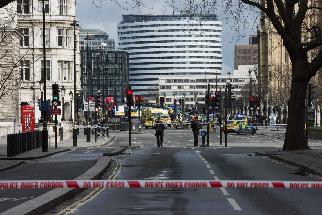 Police stand guard after sealing off streets around Parliament on Wednesday.
