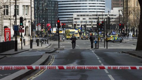 Police stand guard after sealing off streets around Parliament on Wednesday.
