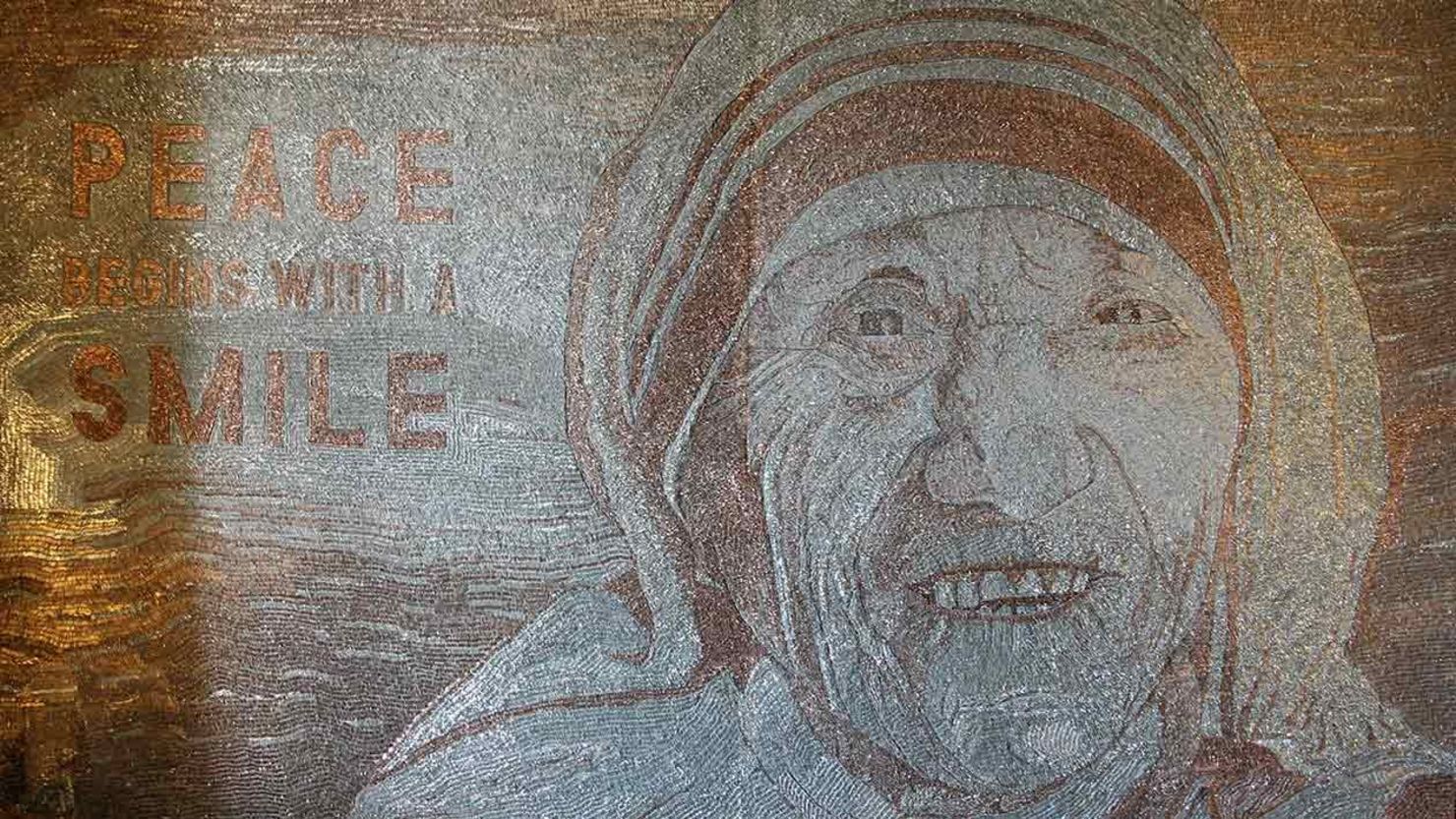 Artist Saimir Strati was inspired by the refugee crisis to create Mother Teresa's smiling portrait.