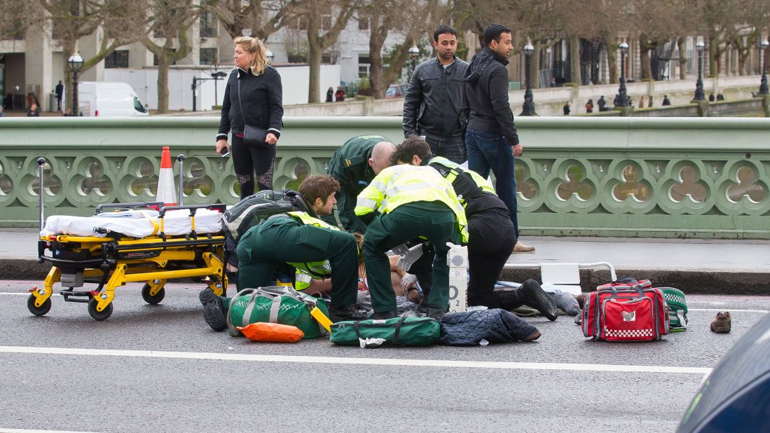 Medics treat a victim on Westminster Bridge.