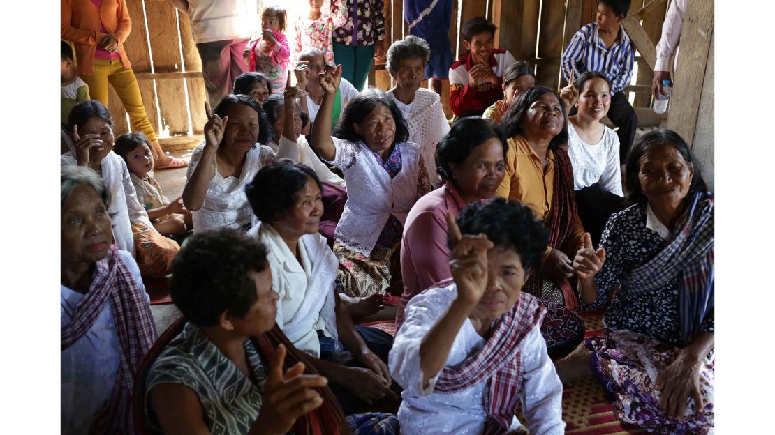 Women participate in a TB awareness and education session in Srosomthmy village.