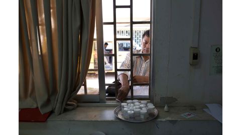 A community health worker delivers sputum samples to CENAT hospital in Phnom Penh, Cambodia.