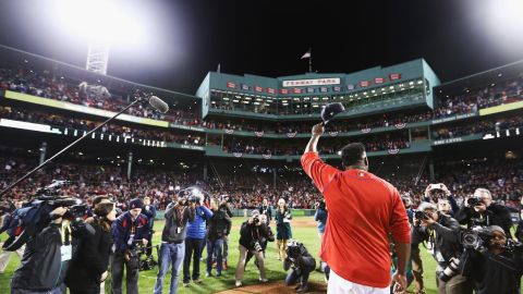 David Ortiz of the Boston Red Sox raises his cap after his team's defeat in Game 3 of the 2016 American League Division Series.