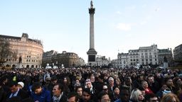 People gather ahead of a candlelit vigil at Trafalgar Square on March 23, 2017 in London, England. 