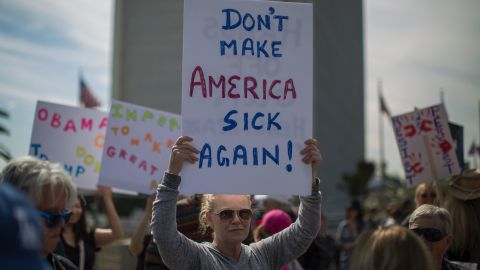 Protesters in Los Angeles express their support for the Affordable Care Act.