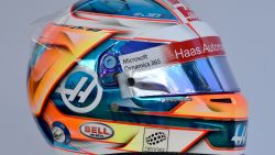 The helmet of Haas F1's French driver Romain Grosjean is displayed in Melbourne on March 23, 2017, ahead of the Formula One Australian Grand Prix. / AFP PHOTO / Paul Crock / -- IMAGE RESTRICTED TO EDITORIAL USE - STRICTLY NO COMMERCIAL USE --        (Photo credit should read PAUL CROCK/AFP/Getty Images)
