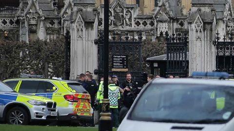 Paramedics arrive at Carriage Gates, where police officer Ketih Palmer was standing guard, after the Westminster attack.