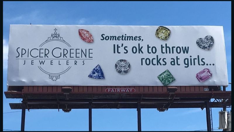 Jewelry store apologizes for billboard