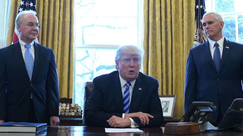 US President Donald Trump, with Vice President Mike Pence (R) and Health and Human Services Secretary Tom Price (L), speaks from the Oval Office of the White House in Washington, DC, on March 24, 2017.
Trump on Friday asked US Speaker of the House Paul Ryan to withdraw the embattled Republican health care bill, moments before a vote, signaling a major political defeat for the US president. / AFP PHOTO / MANDEL NGAN        (Photo credit should read MANDEL NGAN/AFP/Getty Images)