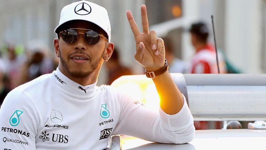 Polesitter Lewis Hamilton celebrates after taking top spot on the grid for Mercedes at Albert Park