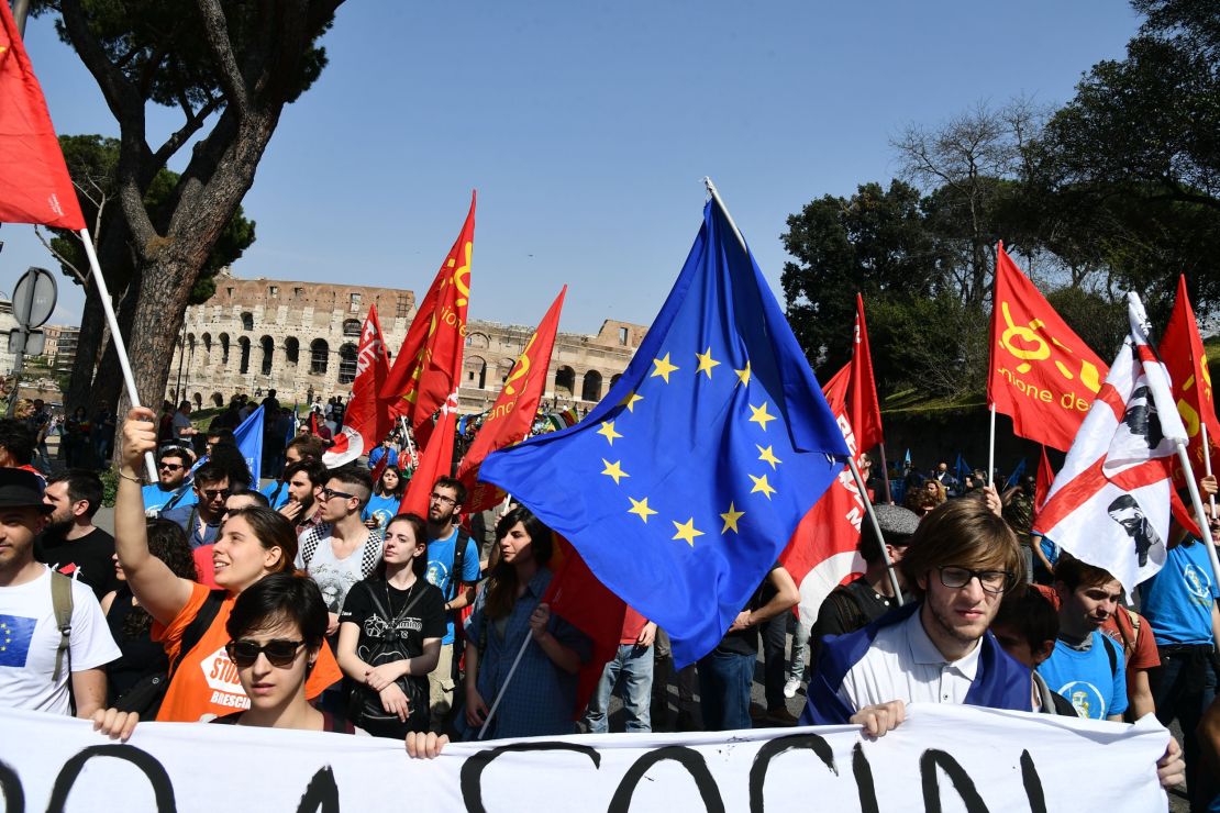People take part in a pro-Europe demonstration Saturday near the Colosseum in Rome.